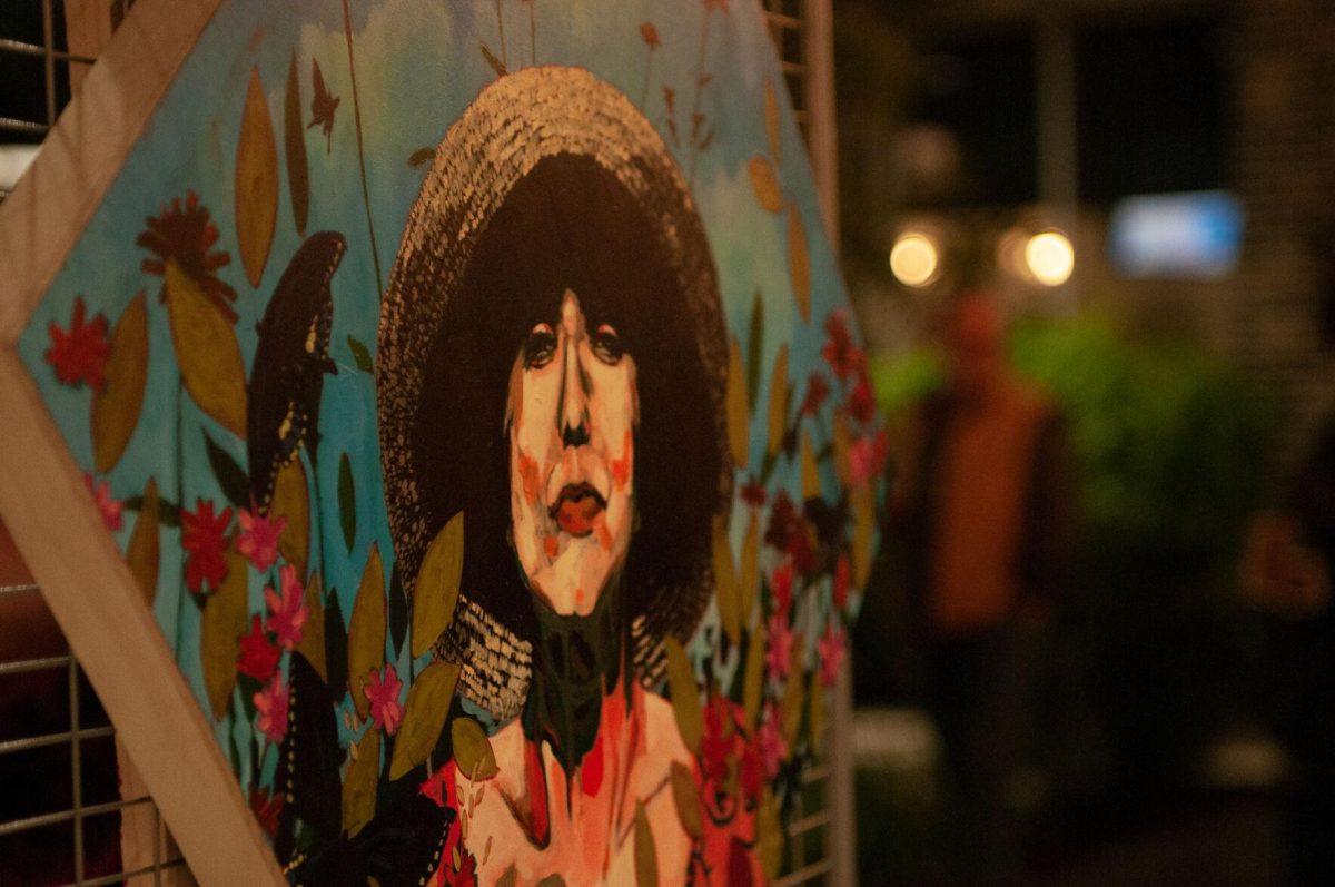 A beautiful painting sits on a display wall on Friday, Nov. 18, 2022, at Mid City Merchant's White Light Night on Government Street in Baton Rouge, La.