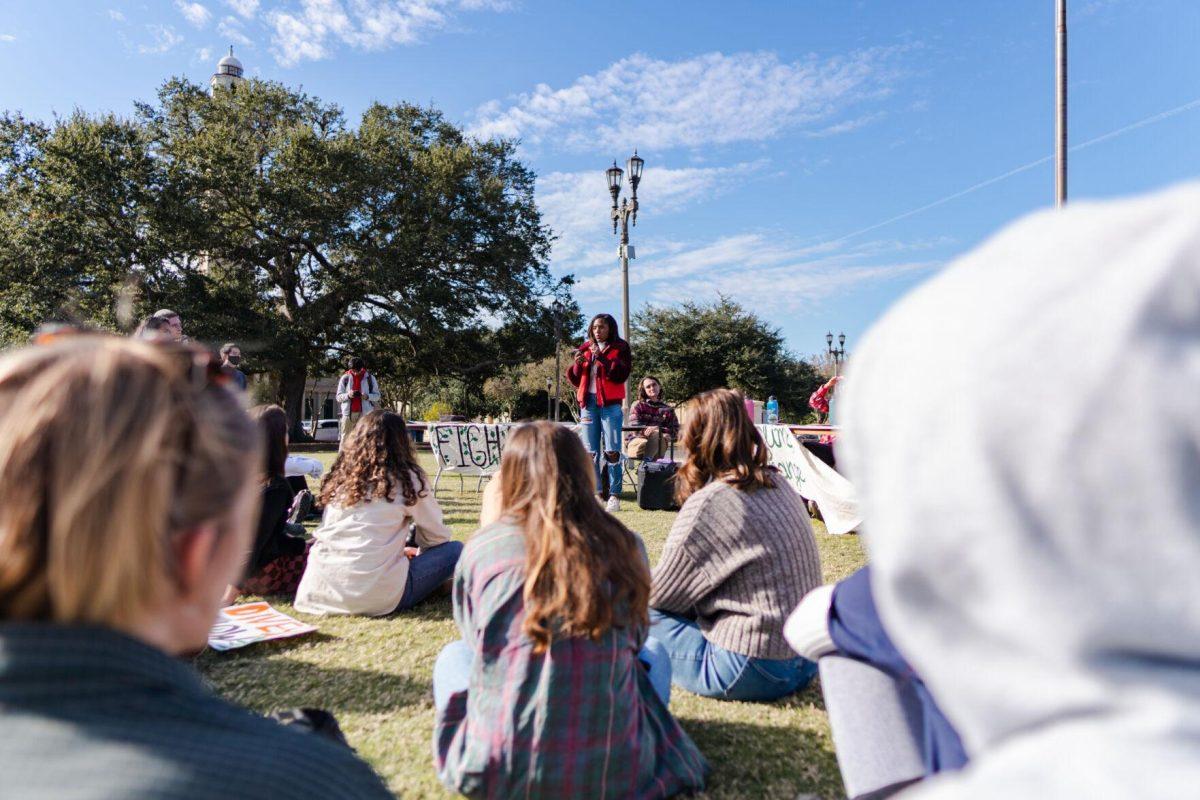 Jayda Jeffery speaks to the crowd on Friday, Nov. 18, 2022, on the LSU Parade Ground before the march begins.