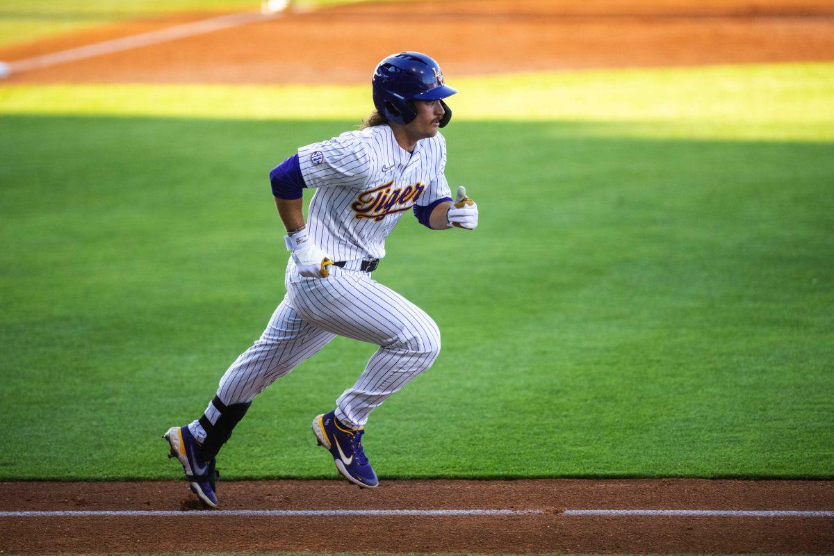 LSU baseball sophomore outfielder Dylan Crews (3) runs to first base Monday, May, 3, 2022, during the Tigers&#8217; 10-6 win against Nicholls at Alex Box Stadium in Baton Rouge, La.