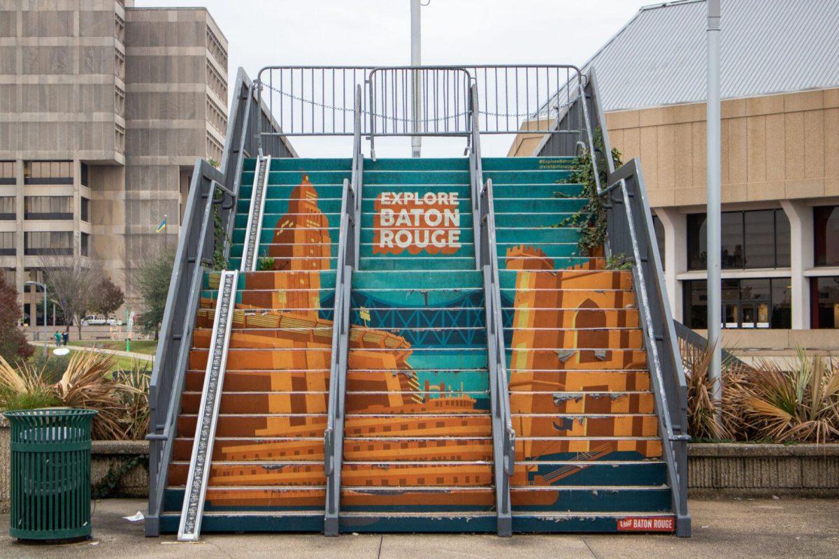 A mural decorates a set of stairs on Friday, Dec 2, 2022, in downtown Baton Rouge, La.