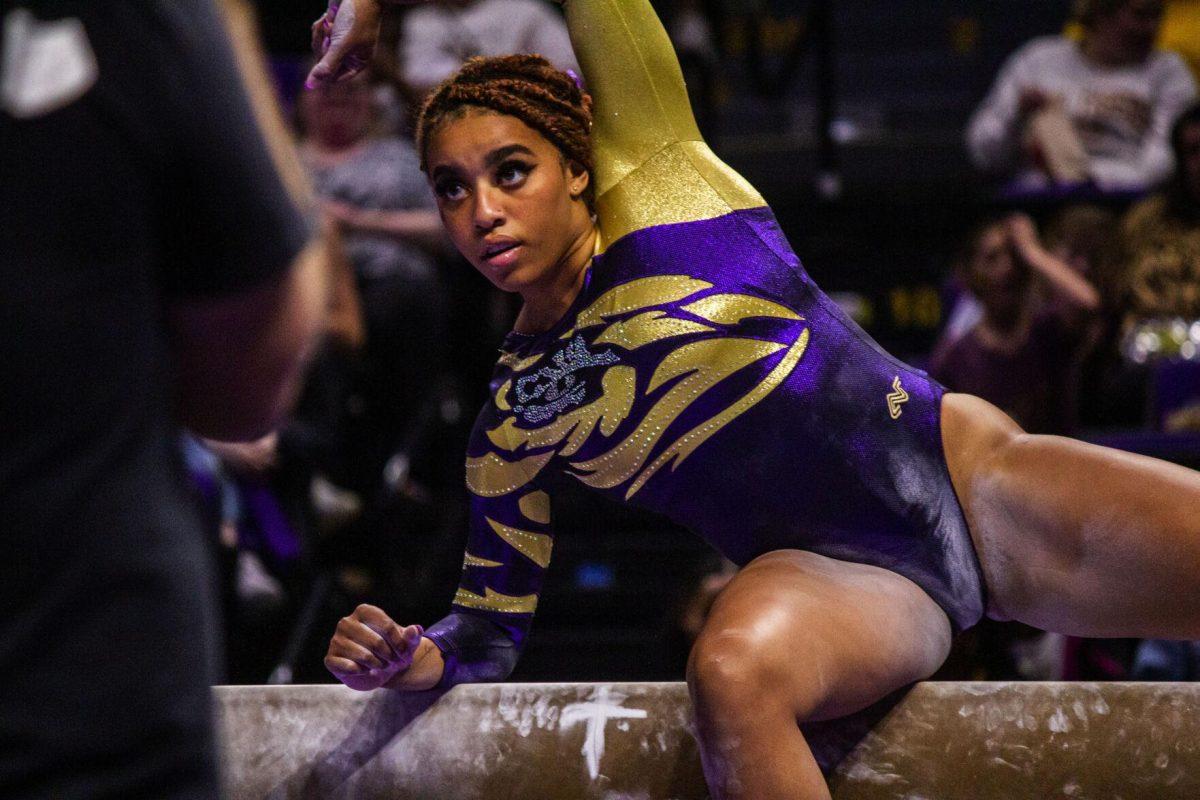 LSU gymnastics senior all-around Kai Rivers performs her routine on the balance beam Monday, Dec. 12, 2022, during the annual "Gym 101" showcase in the Pete Maravich Assembly Center.