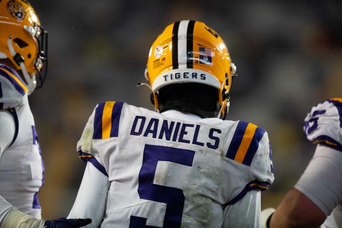 LSU junior quarterback Jayden Daniels (5) celebrates after scoring a touchdown during LSU&#8217;s 41-10 win against the UAB Blazers on Saturday, Nov. 19, 2022, in Tiger Stadium.