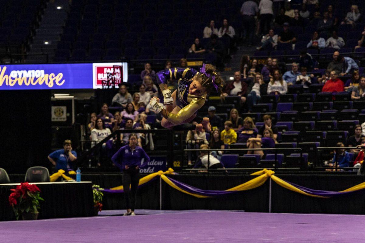LSU gymnastics sophomore all-around KJ Johnson spins over the floor Monday, Dec. 12, 2022, during the annual "Gym 101" showcase in the Pete Maravich Assembly Center.