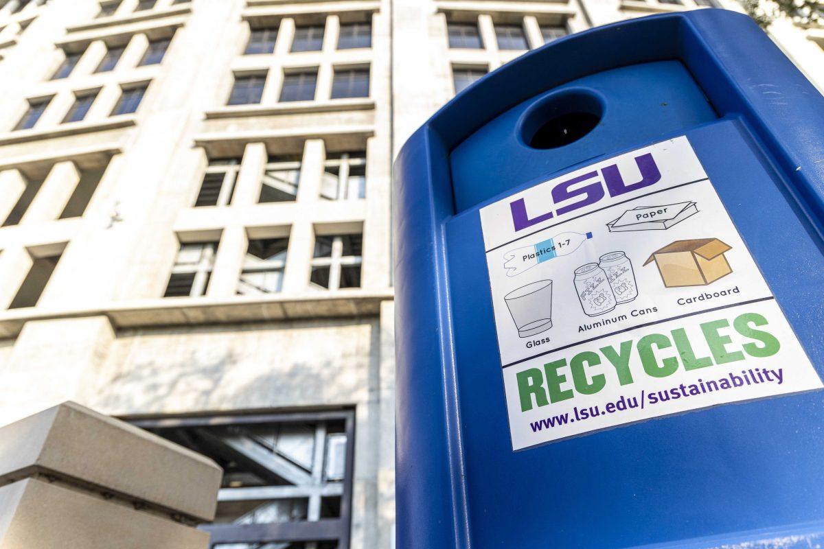 A blue recycling bin sits Friday, Dec. 9, 2022, in from of Tiger Stadium on S. Stadium Drive.