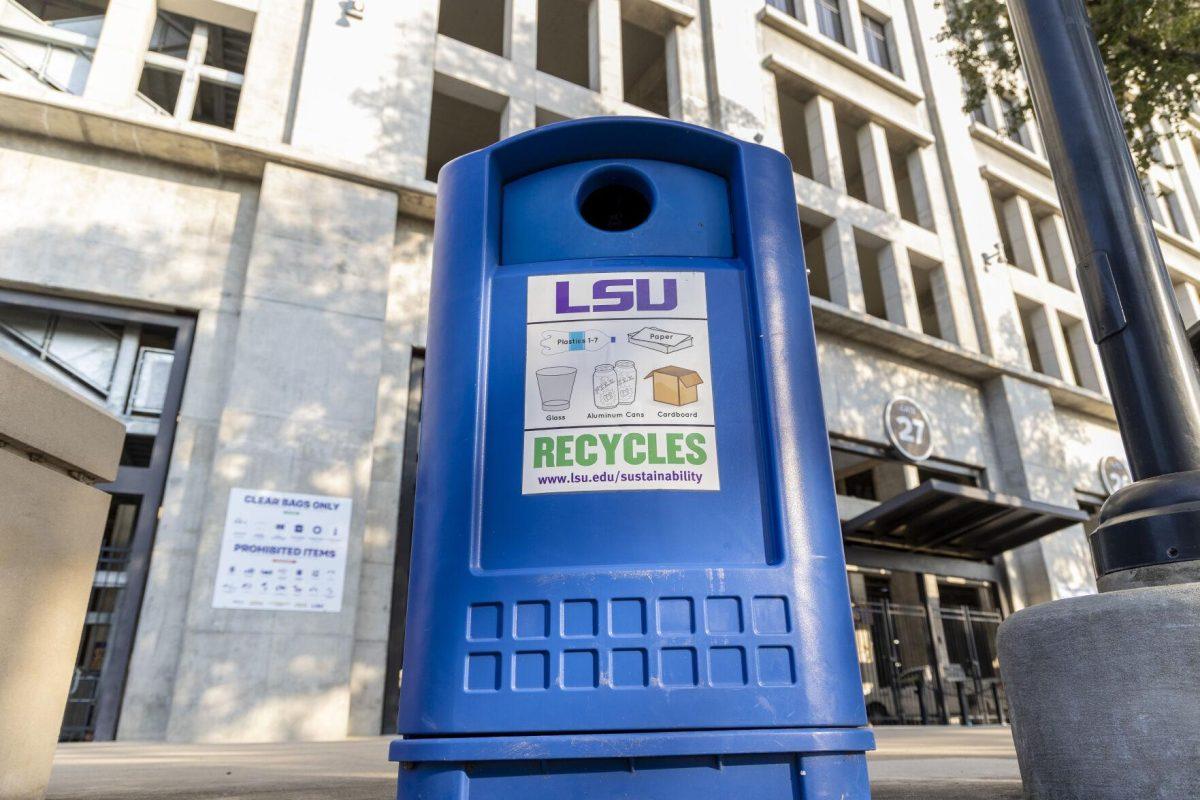 A blue recycling bin sits Friday, Dec. 9, 2022, in from of Tiger Stadium on S. Stadium Drive.