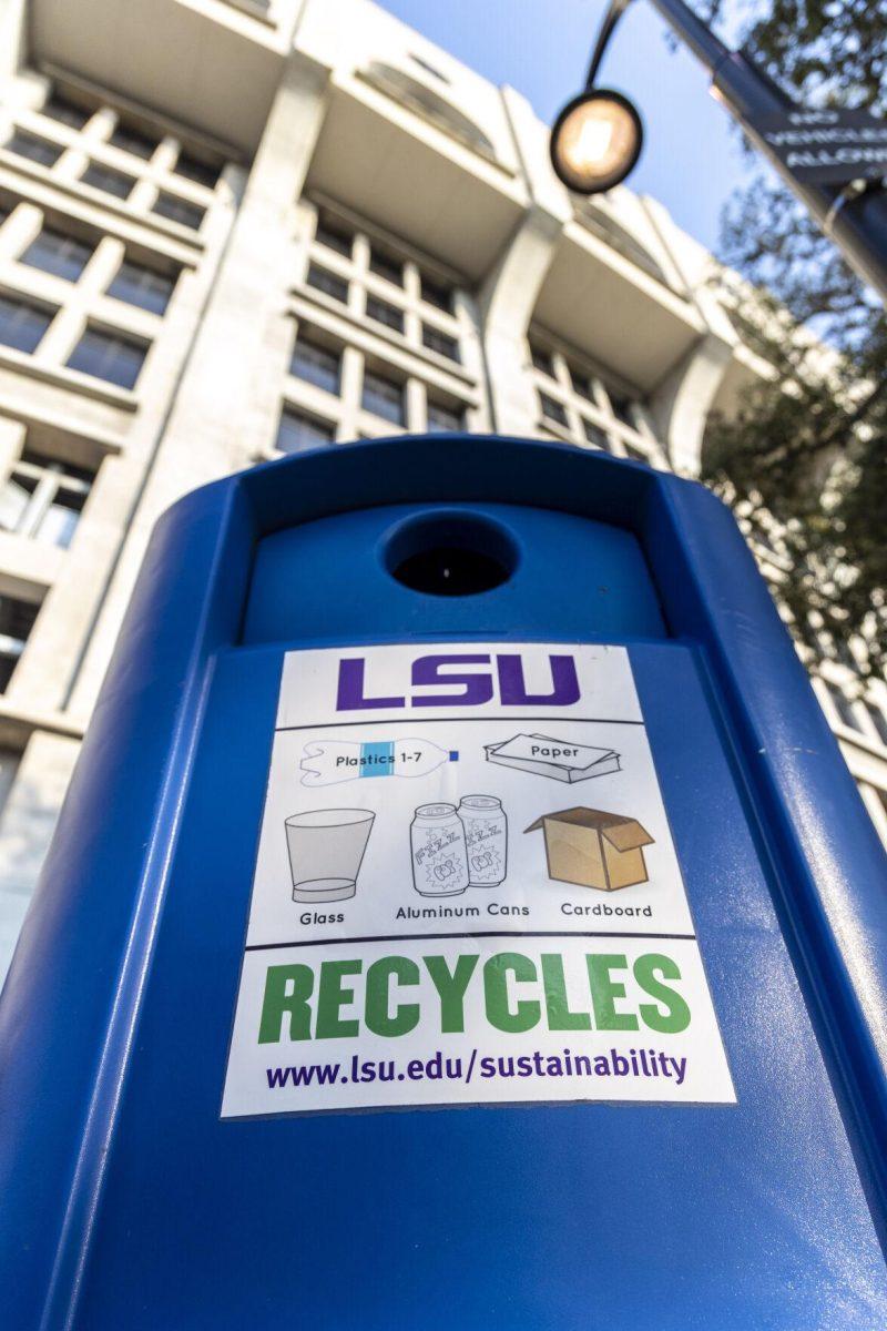 A blue recycling bin sits Friday, Dec. 9, 2022, in from of Tiger Stadium on S. Stadium Drive.