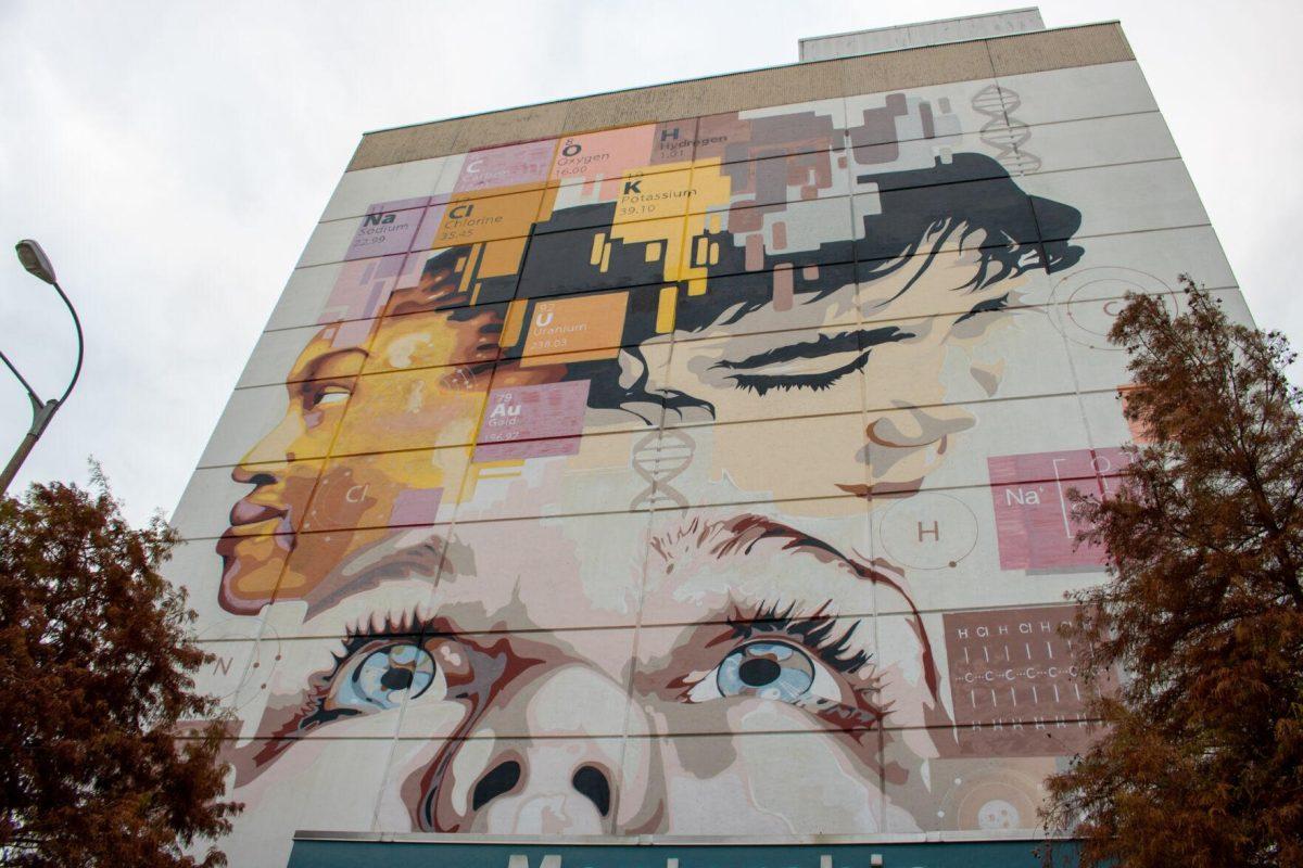 A mural reaches up the side of a building on Friday, Dec 2, 2022, in downtown Baton Rouge, La.