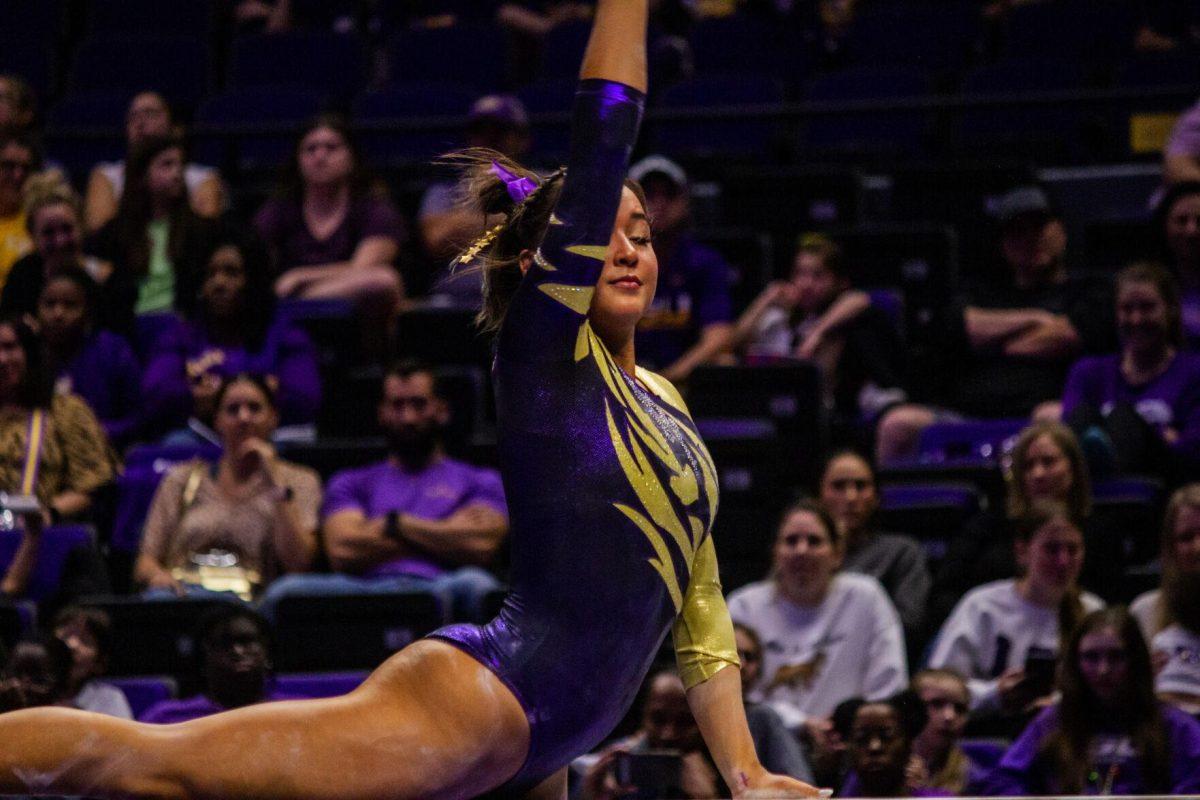 LSU gymnastics sophomore all-around Aleah Finnegan poses on the balance beam Monday, Dec. 12, 2022, during the annual "Gym 101" showcase in the Pete Maravich Assembly Center.