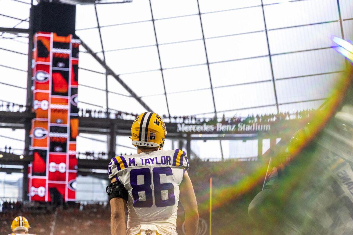 LSU football freshman tight end Mason Taylor (86) looks out onto the field Saturday, Dec. 3, 2022, prior to the Southeastern Conference Championship game against Georgia at the Mercedes-Benz Stadium in Atlanta, Georgia.
