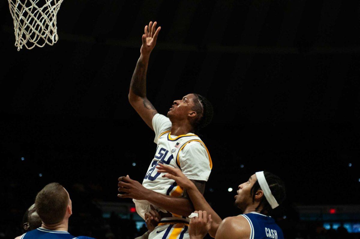 LSU men&#8217;s basketball junior Derek Fountain (20) reaches up during LSU&#8217;s 63-59 win against UT Arlington on Friday, Dec. 2, 2022, in the Pete Maravich Assembly Center on N. Stadium Drive in Baton Rouge, La.