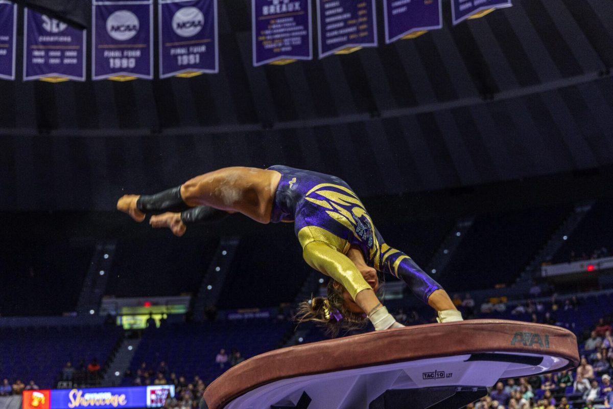 LSU gymnastics all-around sophomore KJ Johnson performs on the vault Monday, Dec. 12, 2022, during the annual "Gym 101" showcase in the Pete Maravich Assembly Center.