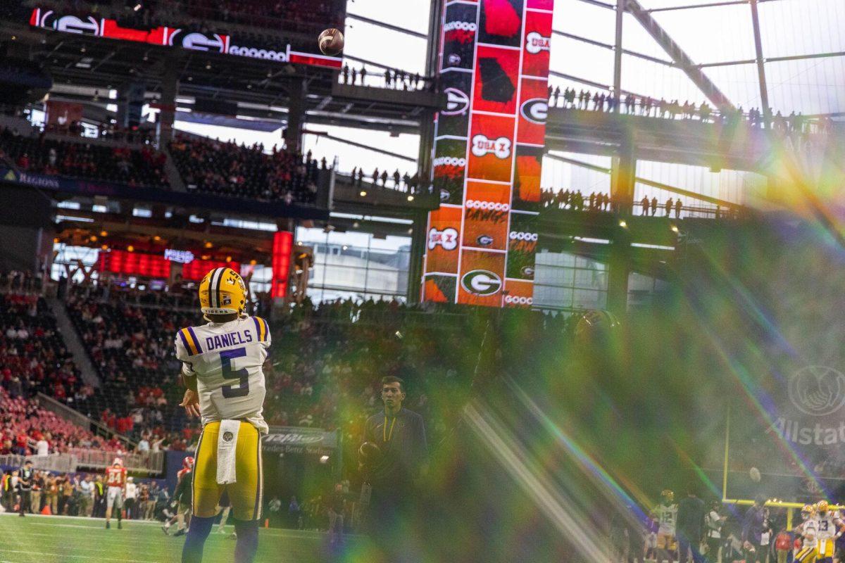 LSU football junior quarterback Jayden Daniels (5) looks out onto the field Saturday, Dec. 3, 2022, prior to the Southeastern Conference Championship game against Georgia at the Mercedes-Benz Stadium in Atlanta, Georgia.
