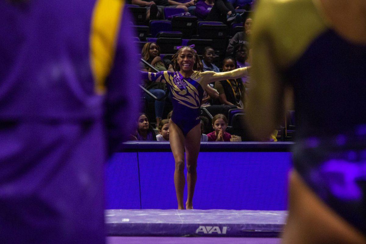 LSU gymnastics freshman all-around Bryce Wilson completes her first floor routine for LSU Monday, Dec. 12, 2022, during the annual "Gym 101" showcase in the Pete Maravich Assembly Center.