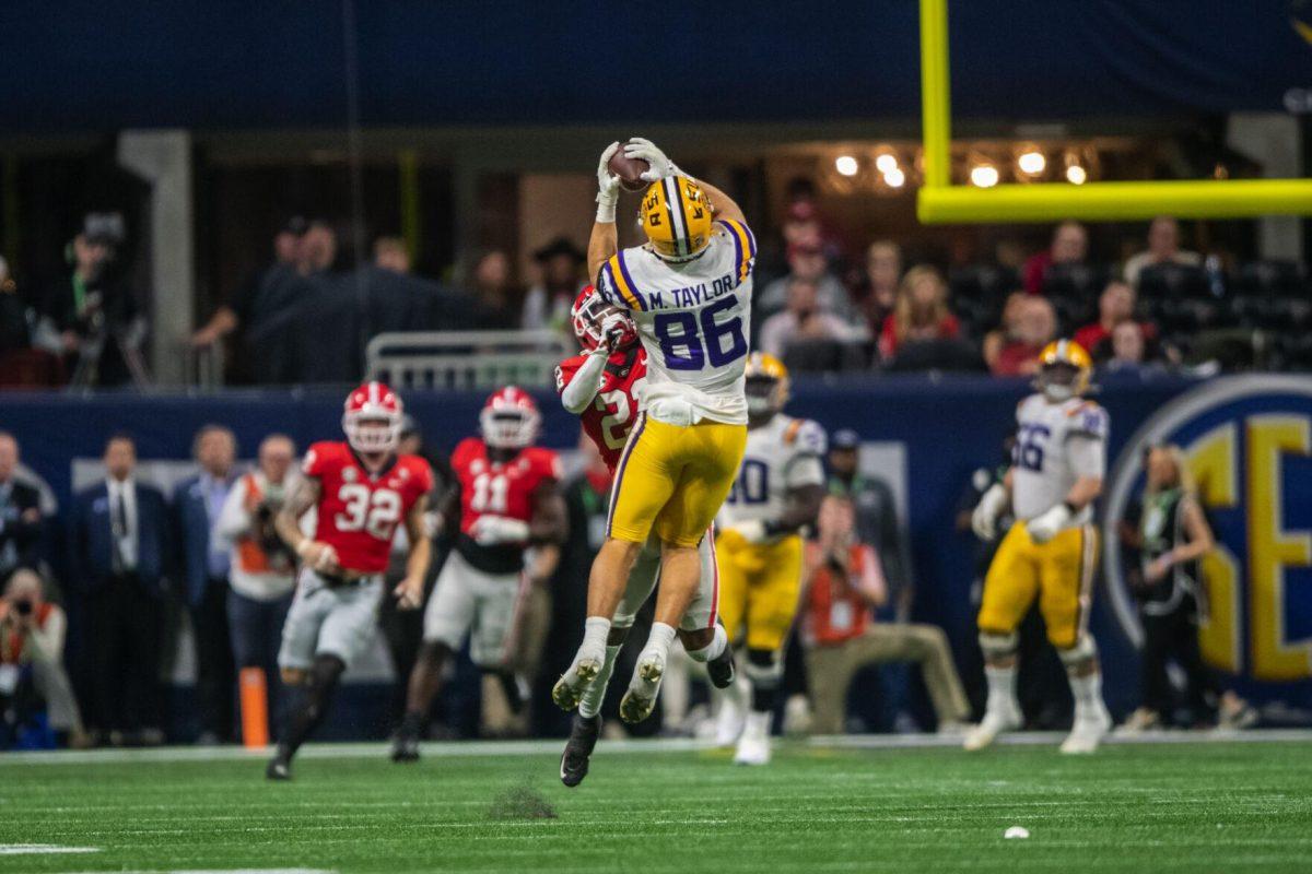 LSU football freshman tight end Mason Taylor (86) catches the ball Saturday, Dec. 3, 2022, during LSU's 30-50 defeat to Georgia at the Southeastern Conference Championship in the Mercedes-Benz Stadium in Atlanta, Georgia.