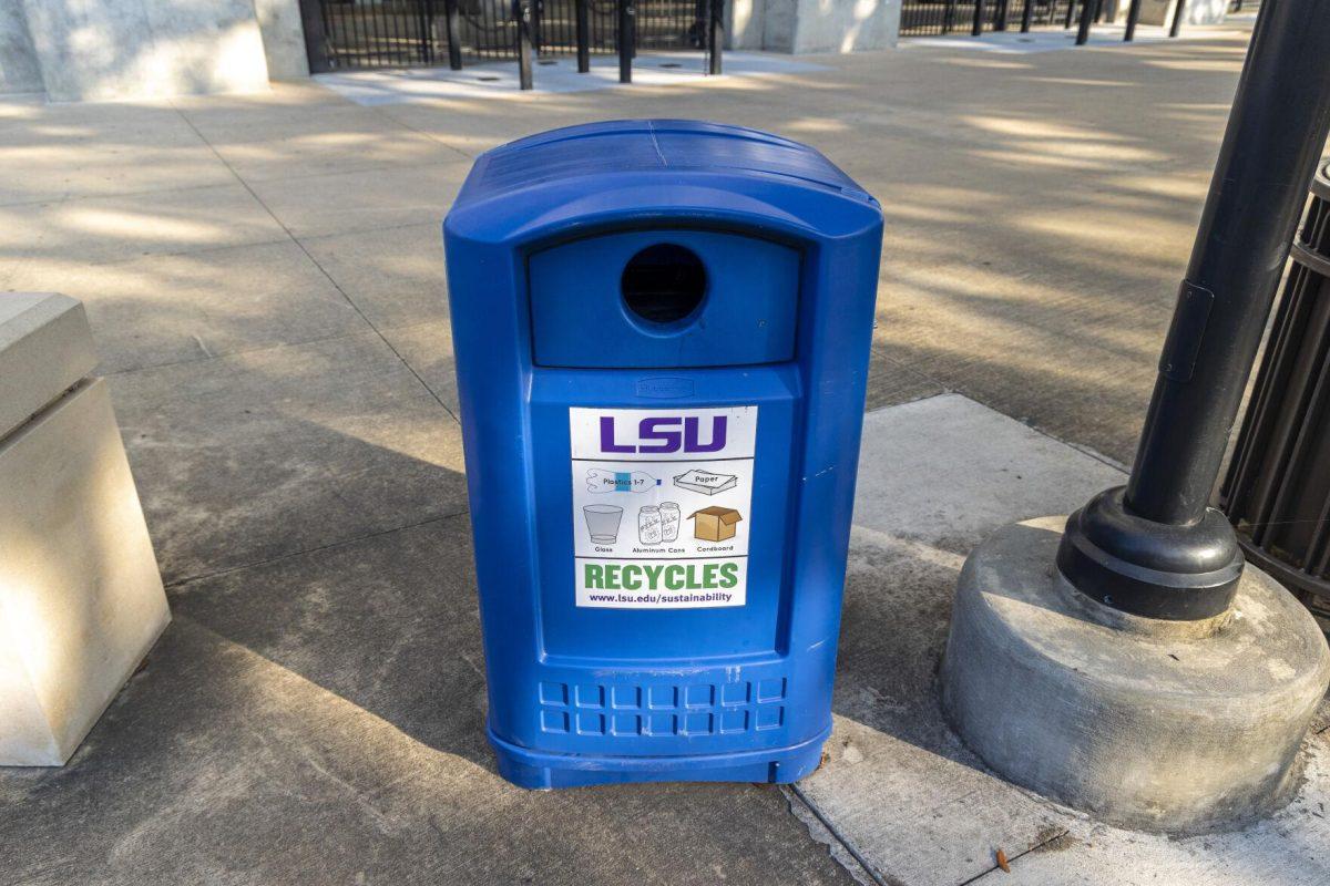 A blue recycling bin sits Friday, Dec. 9, 2022, in from of Tiger Stadium on S. Stadium Drive.