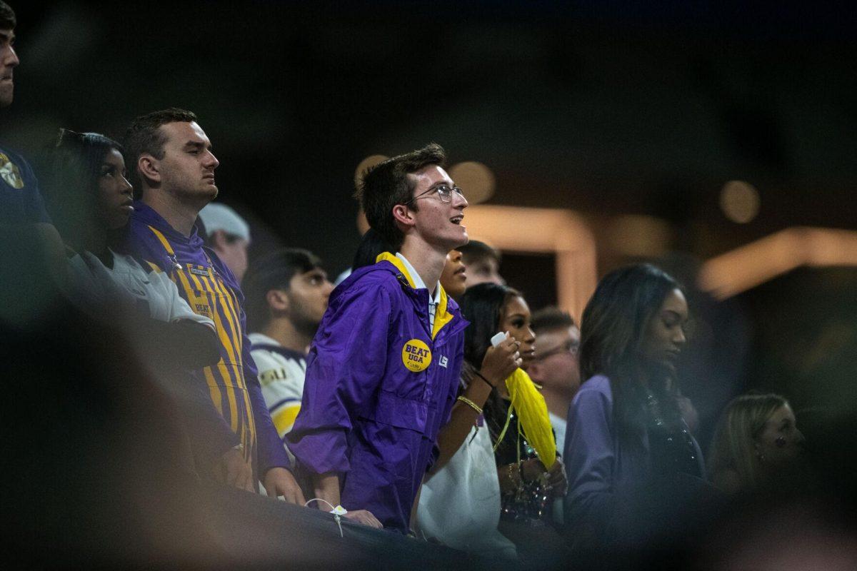 An LSU fan watches the game with excitement Saturday, Dec. 3, 2022, during LSU's 30-50 defeat to Georgia at the Southeastern Conference Championship in the Mercedes-Benz Stadium in Atlanta, Georgia.