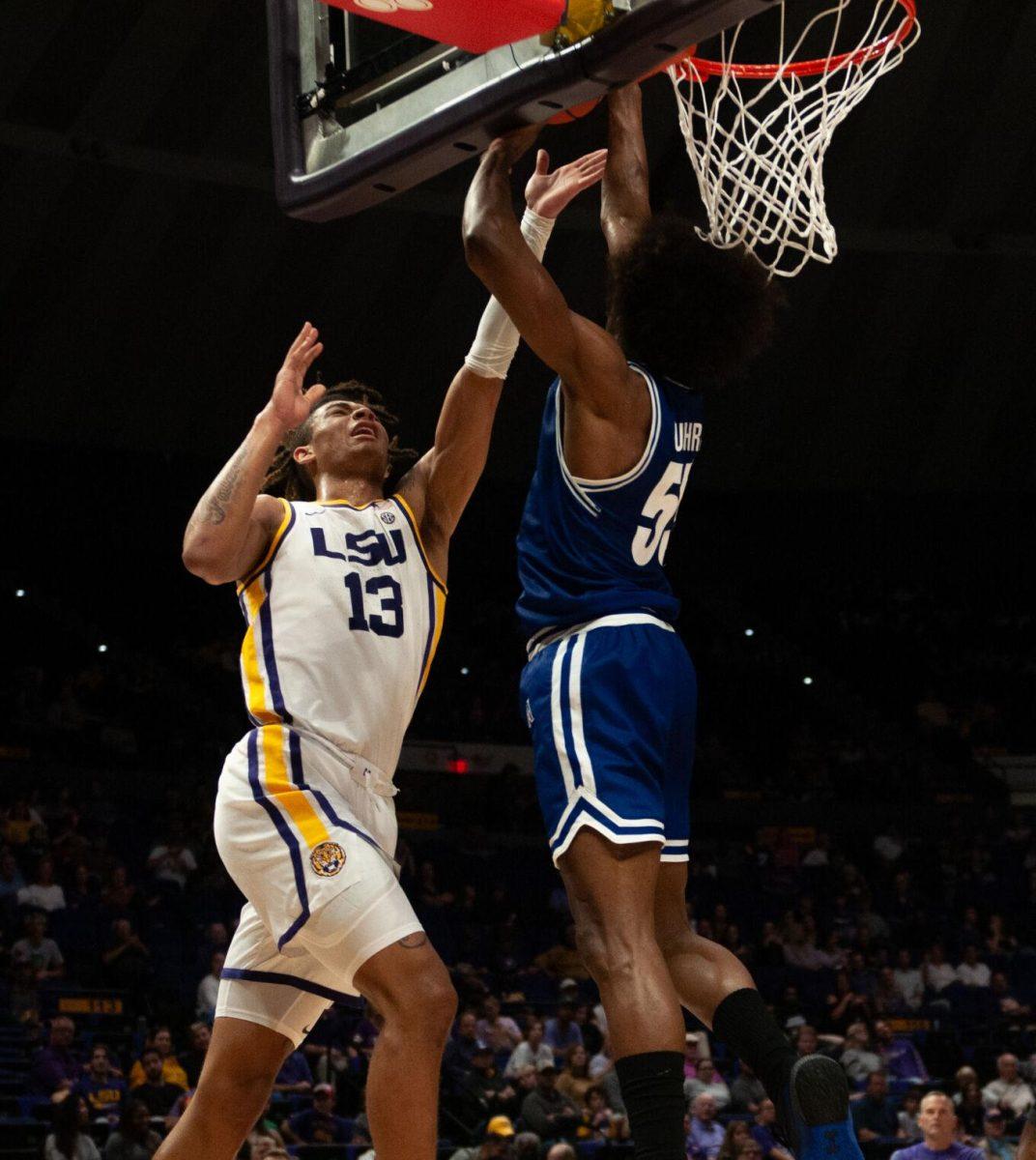 LSU men&#8217;s basketball freshman Jalen Reed (13) attempts to shoot the ball during LSU&#8217;s 63-59 win against UT Arlington on Friday, Dec. 2, 2022, in the Pete Maravich Assembly Center on N. Stadium Drive in Baton Rouge, La.