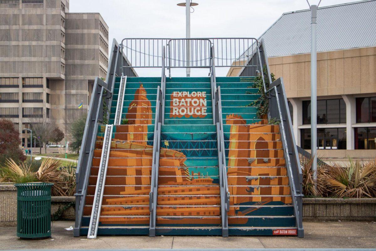 A mural decorates a set of stairs on Friday, Dec 2, 2022, in downtown Baton Rouge, La.