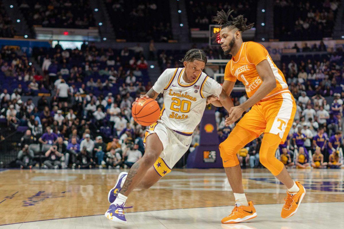 <p>LSU men’s basketball junior forward Derek Fountain (20) drives toward the basket on Saturday, Jan. 21, 2023, during LSU’s 56-77 loss to Tennessee at the Pete Maravich Assembly Center in Baton Rouge, La.</p>