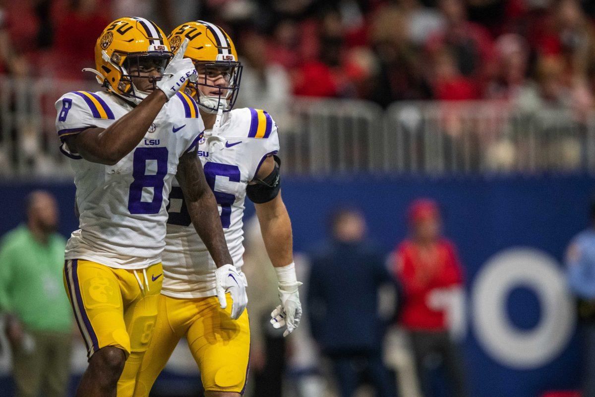 LSU football sophomore wide receiver Malik Nabers (8) celebrates a touchdown Saturday, Dec. 3, 2022, during LSU's 30-50 defeat to Georgia at the Southeastern Conference Championship at the Mercedes-Benz Stadium in Atlanta, Georgia.