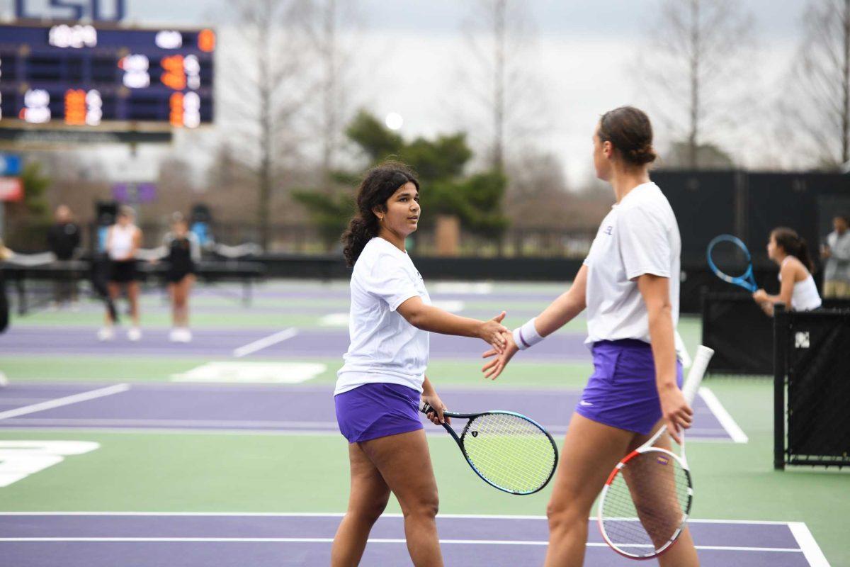 LSU women&#8217;s tennis redshirt freshman Anastasiya Komar and freshman Nikita Vishwase celebrate a point during their 6-2 doubles win on Sunday, Jan. 22, 2023, in the first match against University of Louisiana at Monroe at the LSU Tennis Complex on Gourrier Avenue in Baton Rouge, La.