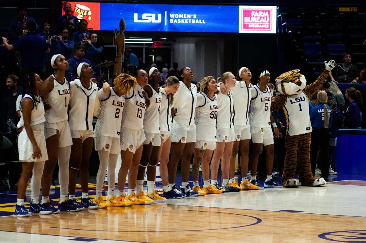 LSU women&#8217;s basketball team stands together to sing the alma mater after LSU&#8217;s 63-55 win against Southeastern on Tuesday, Nov. 29, 2022, in the Pete Maravich Assembly Center on N. Stadium Drive in Baton Rouge, La.