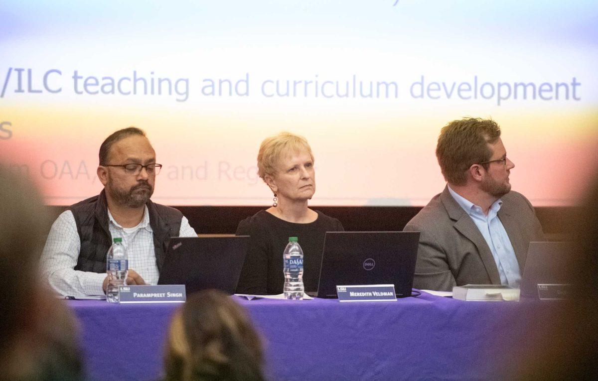 LSU Faculty Senate Executive Committee members listen to speakers on Monday, Jan. 23, 2023, in the Dalton Woods Auditorium in the Energy Coast and Environment Building in Baton Rouge, La.