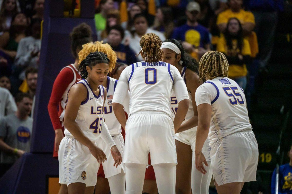 The LSU women's basketball team huddles up on Thursday, Jan. 19, 2023, during LSU's 79-76 win against Arkansas in the Pete Maravich Assembly Center on N. Stadium Drive in Baton Rouge, La.