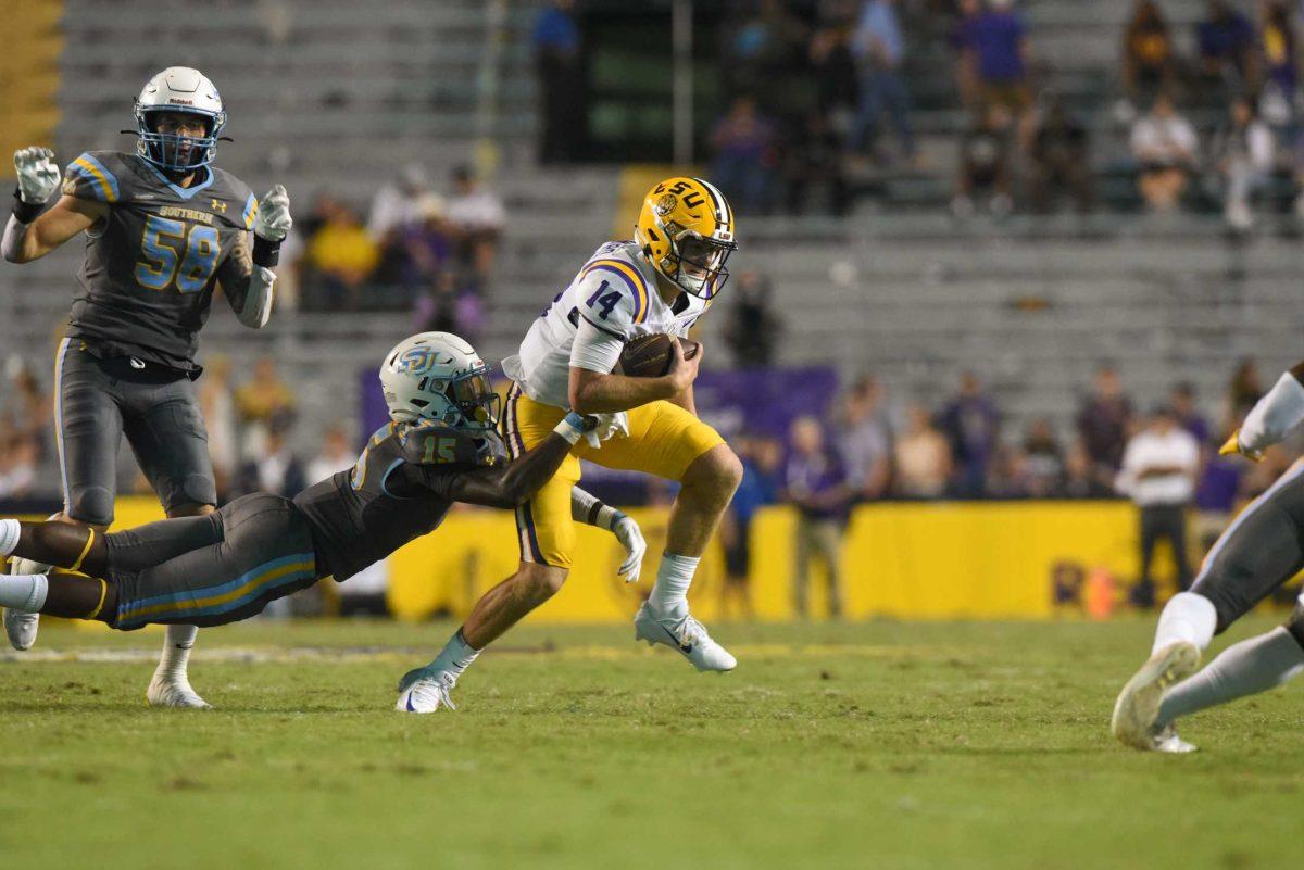 LSU football freshman Walker Howard (14) sprints down the field on Saturday, Sep. 10, 2022, during LSU&#8217;s 65-17 win over Southern at Tiger Stadium in Baton Rouge, La.