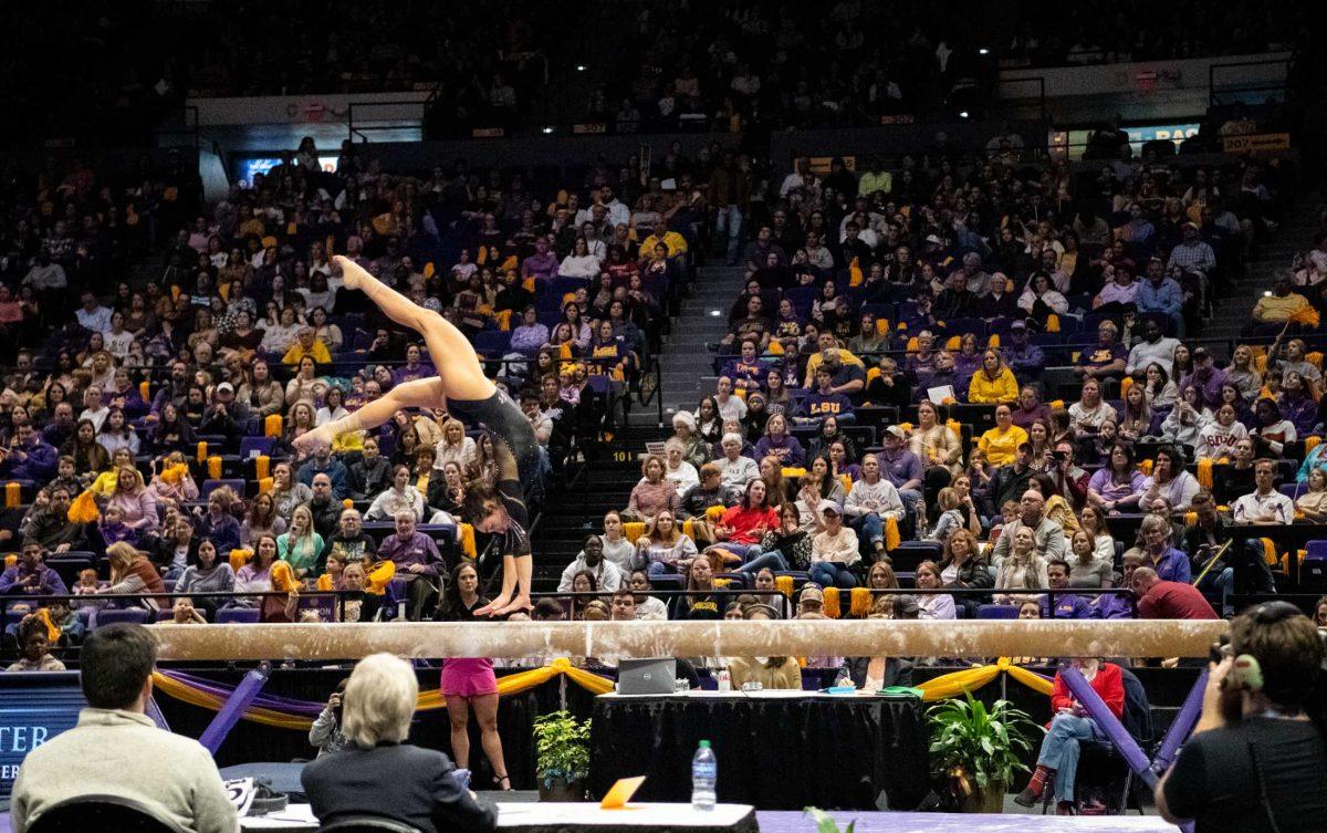 LSU gymnastics all-around junior Elena Arenas flips on the balance beam on Friday, Jan. 20, 2023, during LSU&#8217;s victory over Missouri in the Pete Maravich Assembly Center in Baton Rouge, La.