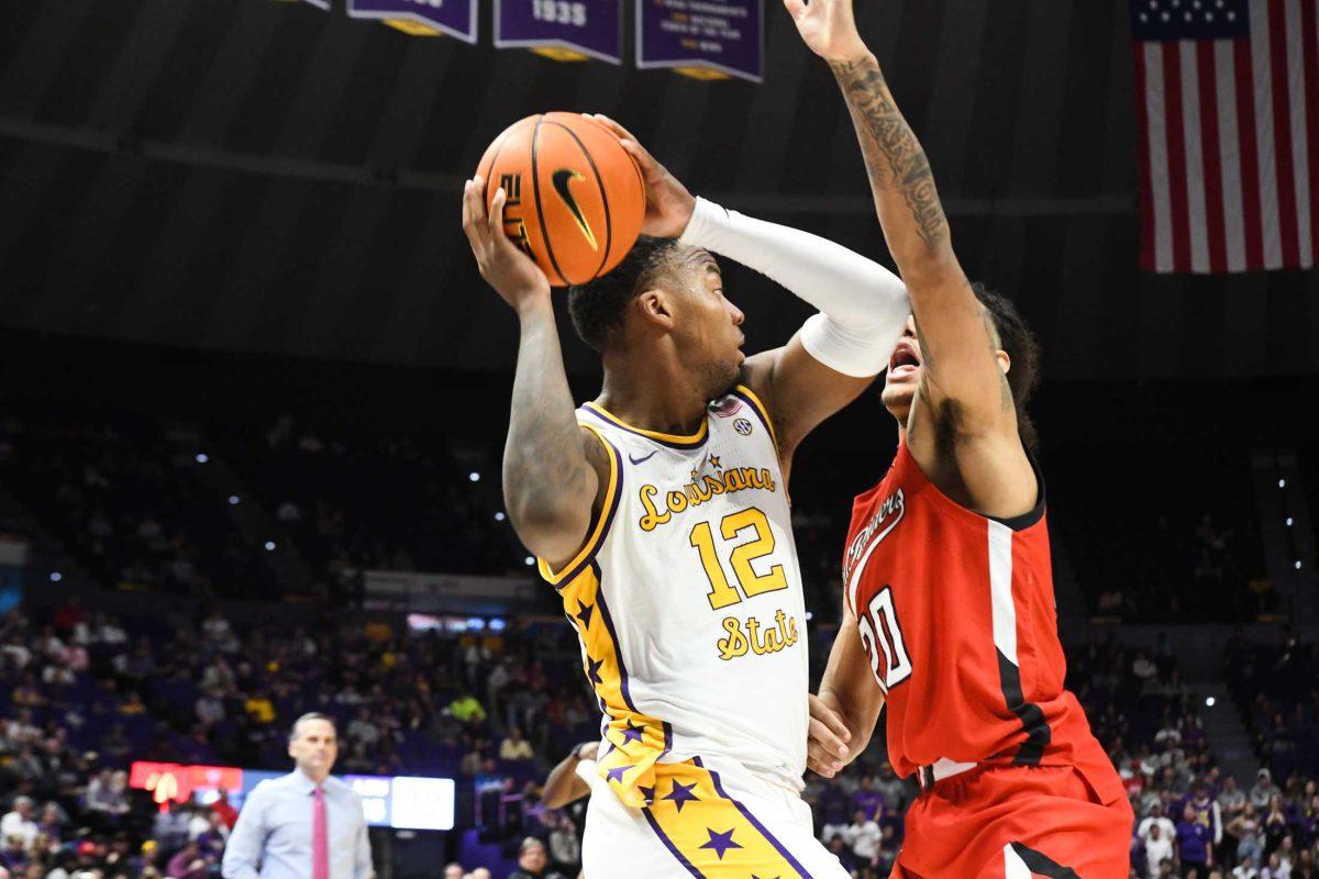 LSU men&#8217;s basketball fifth-year senior forward KJ Williams (12) looks to pass on Saturday, Jan. 28, 2023, during LSU&#8217;s 76-68 loss to Texas Tech at the Pete Maravich Assembly Center in Baton Rouge, La.