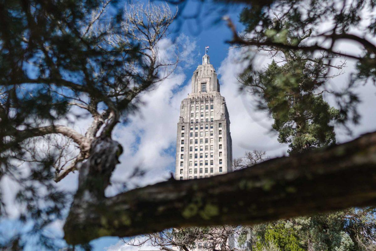 Tree branches frame the State Capitol on Sunday, Jan. 23, 2023, on North Third Street in Baton Rouge, La.