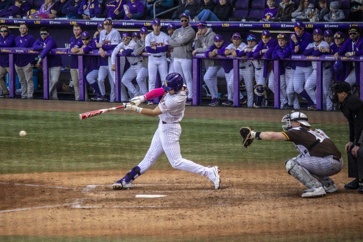 LSU baseball junior outfielder Brayden Jobert (6) hits the ball Saturday, Feb. 18, 2023, during LSU's 5-3 victory over Western Michigan at Alex Box Stadium on LSU's campus.