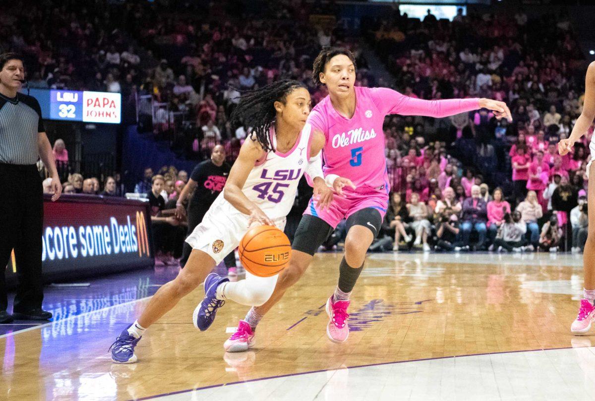 LSU women&#8217;s basketball 5th-year-senior guard Alexis Morris (45) attempts to pass the defense on Thursday, Feb. 16, 2023, during LSU&#8217;s 69-60 victory over Ole Miss in the Pete Maravich Assembly Center in Baton Rouge, La.