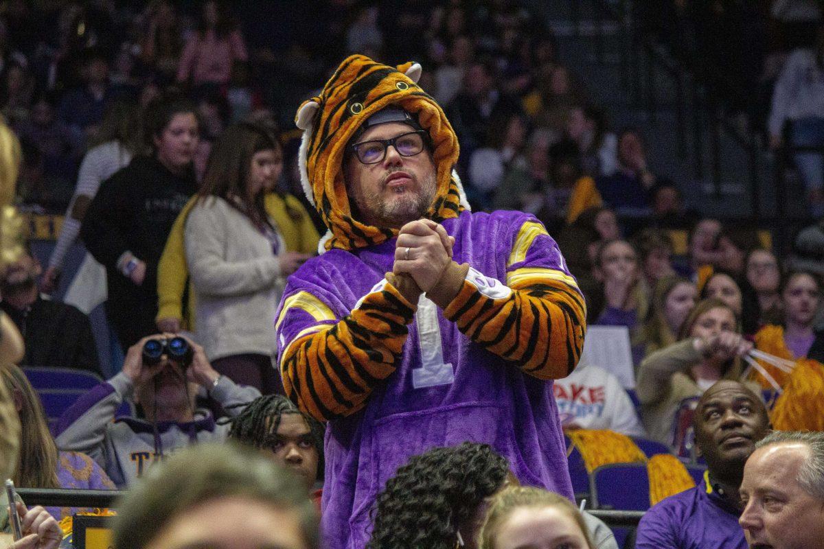 An LSU gymnastics fan dresses in a Mike the Tiger costume Friday, Feb. 3, 2023, during LSU's 197.700 - 196.925 victory over the Georgia bulldogs in the Pete Maravich Assembly Center on LSU's campus.