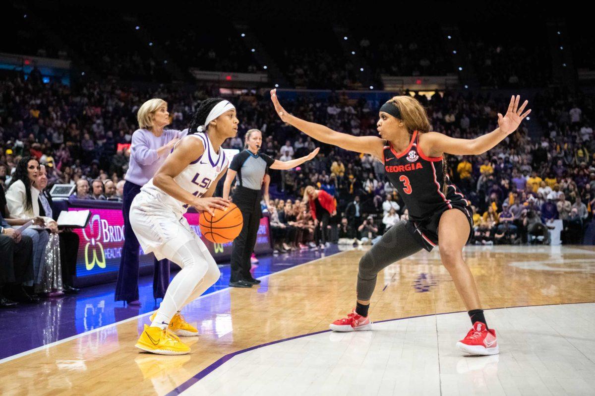 LSU women&#8217;s basketball 5th-year-senior guard Alexis Morris (45) looks past the defense on Thursday, Feb. 2, 2023, during LSU&#8217;s 82-77 victory against UGA in the Pete Maravich Assembly Center in Baton Rouge, La.