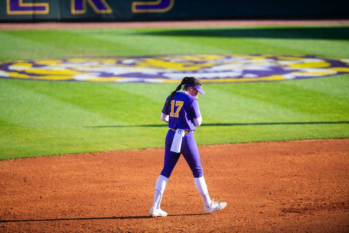 LSU softball redshirt sophomore infielder Taylor Pleasants (17) walks to her position Friday, Feb. 11, 2022, during the Tigers' 3-0 win against South Alabama at Tiger Park in Baton Rouge, La.