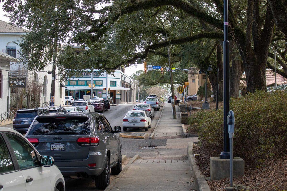 Cars line both sides of the street on Feb. 3, 2023, on W. Chimes St and Highland Rd. in Baton Rouge, La.