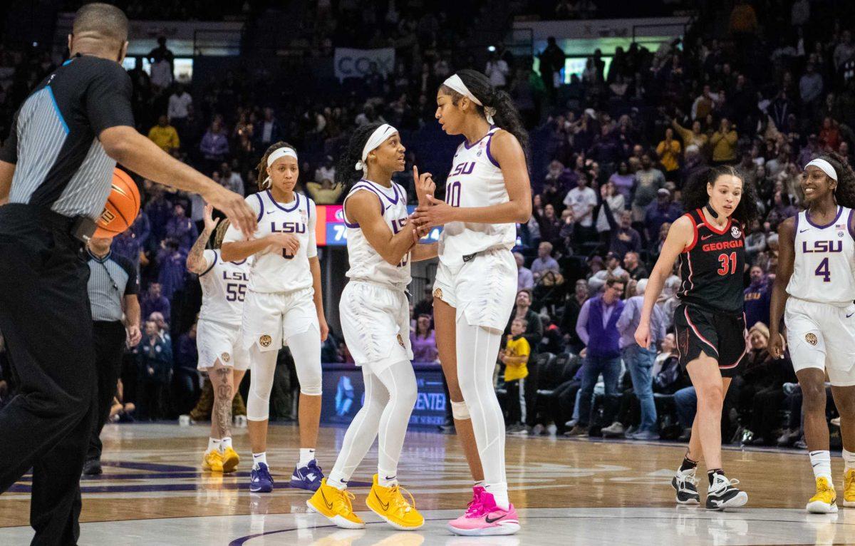 LSU women&#8217;s basketball 5th-year-senior guard Alexis Morris (45) speaks to sophomore forward Angel Reese (10) on Thursday, Feb. 2, 2023, during LSU&#8217;s 82-77 victory against UGA in the Pete Maravich Assembly Center in Baton Rouge, La.