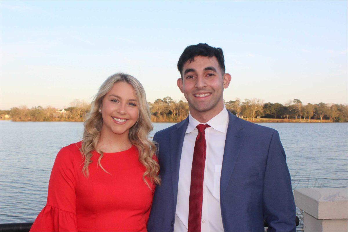 Munjed Isa, the Challenge presidential candidate, right, and Macye Brown, the vice-presidential candidate, left, pose for a photo.&#160;