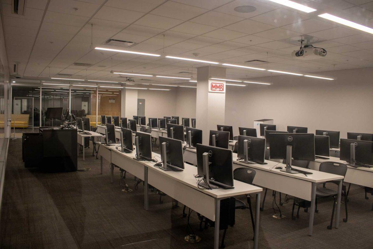 A multitude of computers sit in a classroom in Patrick F. Taylor Hall on Thursday, Jan. 26, 2023, on LSU's Campus.