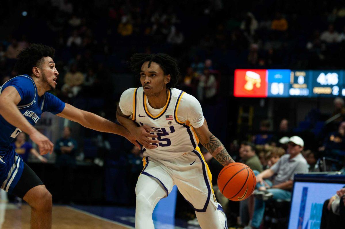 LSU men&#8217;s basketball freshman forward Tyrell Ward (15) dribbles the ball during LSU&#8217;s 91-62 win over New Orleans on Thursday, Nov. 17, 2022, in the Pete Maravich Assembly Center on N. Stadium Drive in Baton Rouge, La.