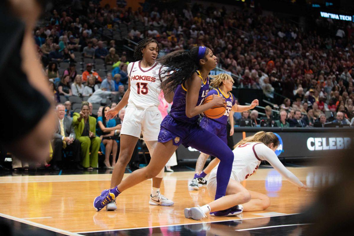 LSU women&#8217;s basketball sophomore forward Angel Reese (10) rebounds the ball on Friday, March 31, 2023, during LSU&#8217;s 79-72 victory over Virginia Tech in the NCAA Final Four in the American Airlines Center in Dallas, Texas.