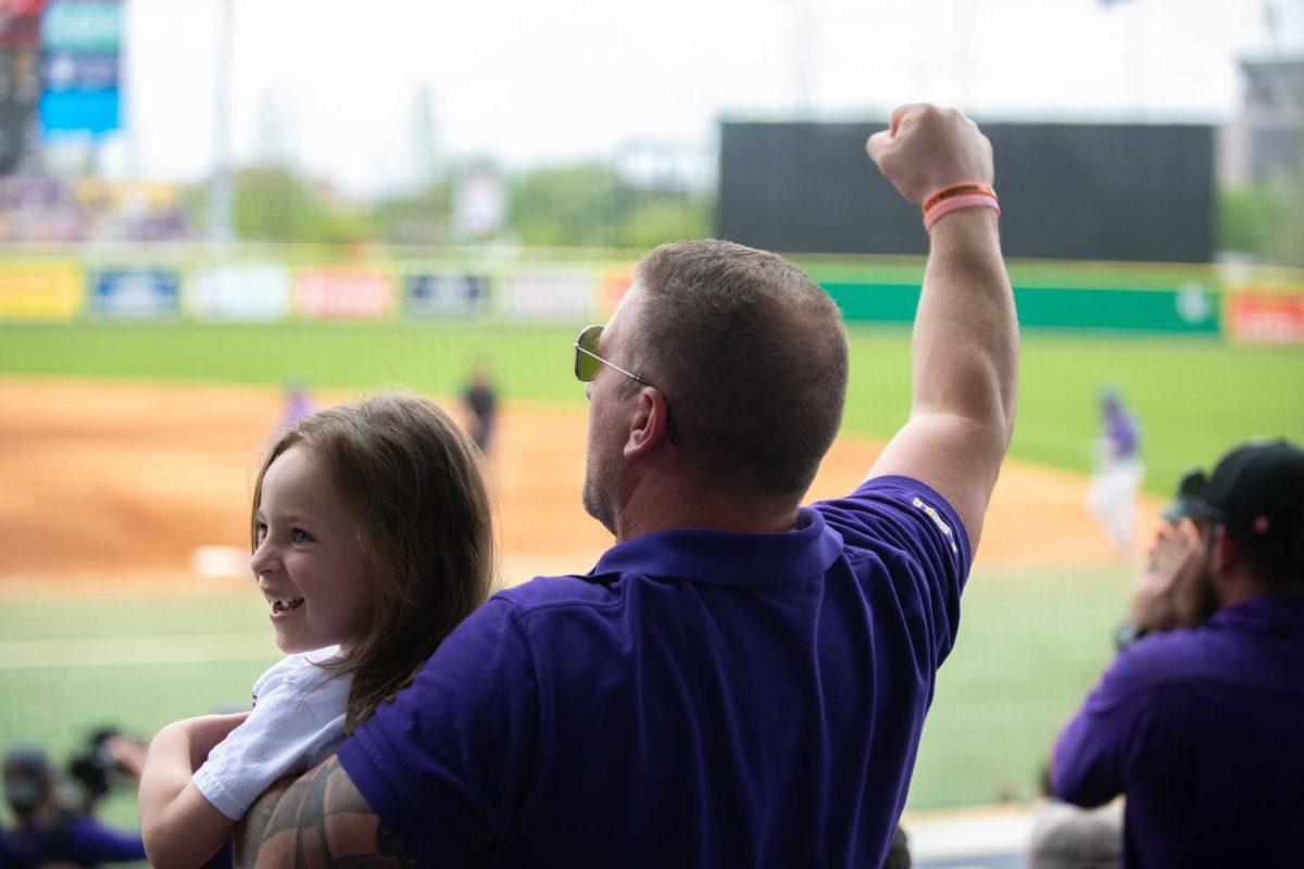 LSU baseball fans cheer on Friday, March 24, 2023, during LSU's 3-9 loss against Arkansas in Alex Box Stadium in Baton Rouge, La.