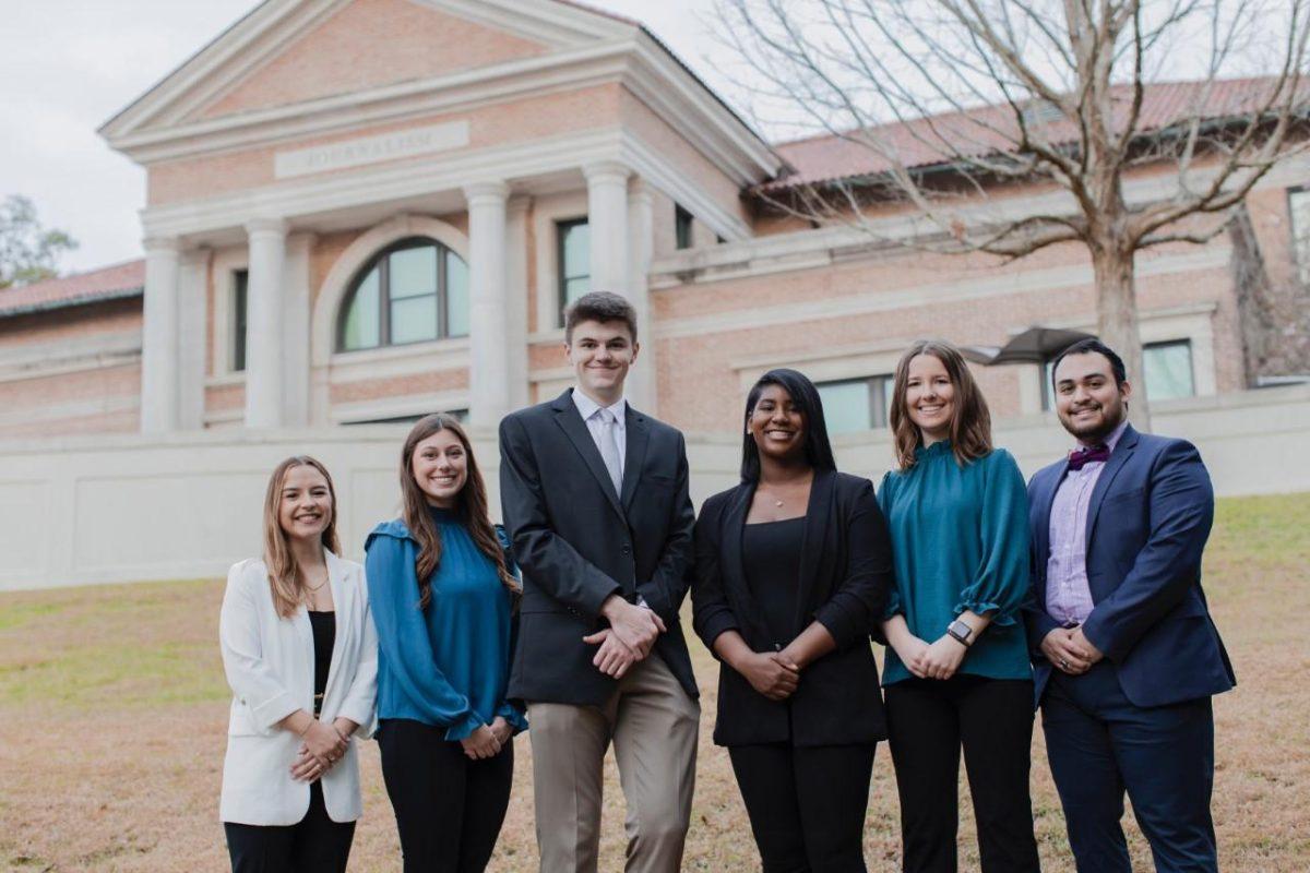 LSU's Bateman team poses for a photo outside of the Journalism Building.