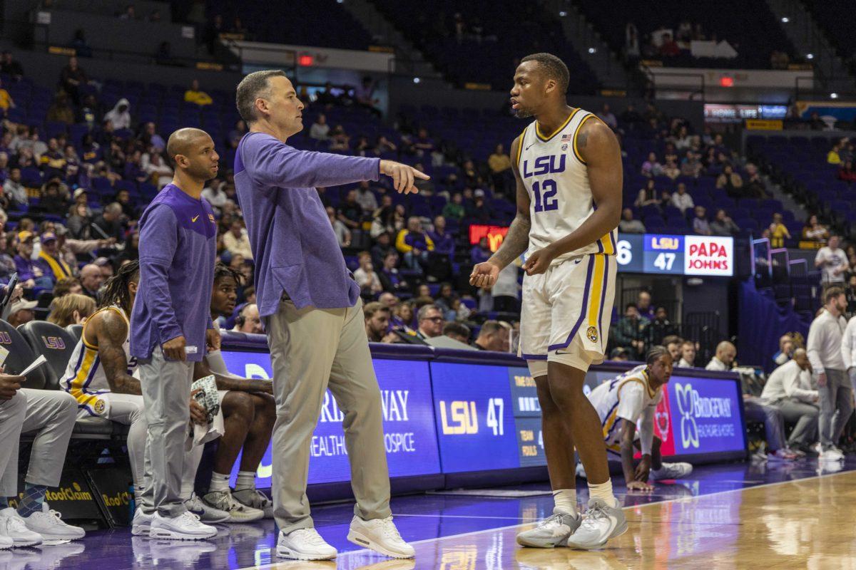 LSU basketball senior forward KJ Williams (12) speaks to his coaches Saturday, Nov. 12, 2022, during LSU's 61-52 victory over Arkansas State at the Pete Maravich Assembly Center on N. Stadium Drive.