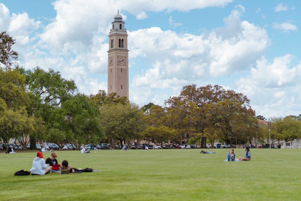 Students lounge about on Thursday, March 24, 2022, on the LSU Parade Ground on Highland Road in Baton Rouge, La.