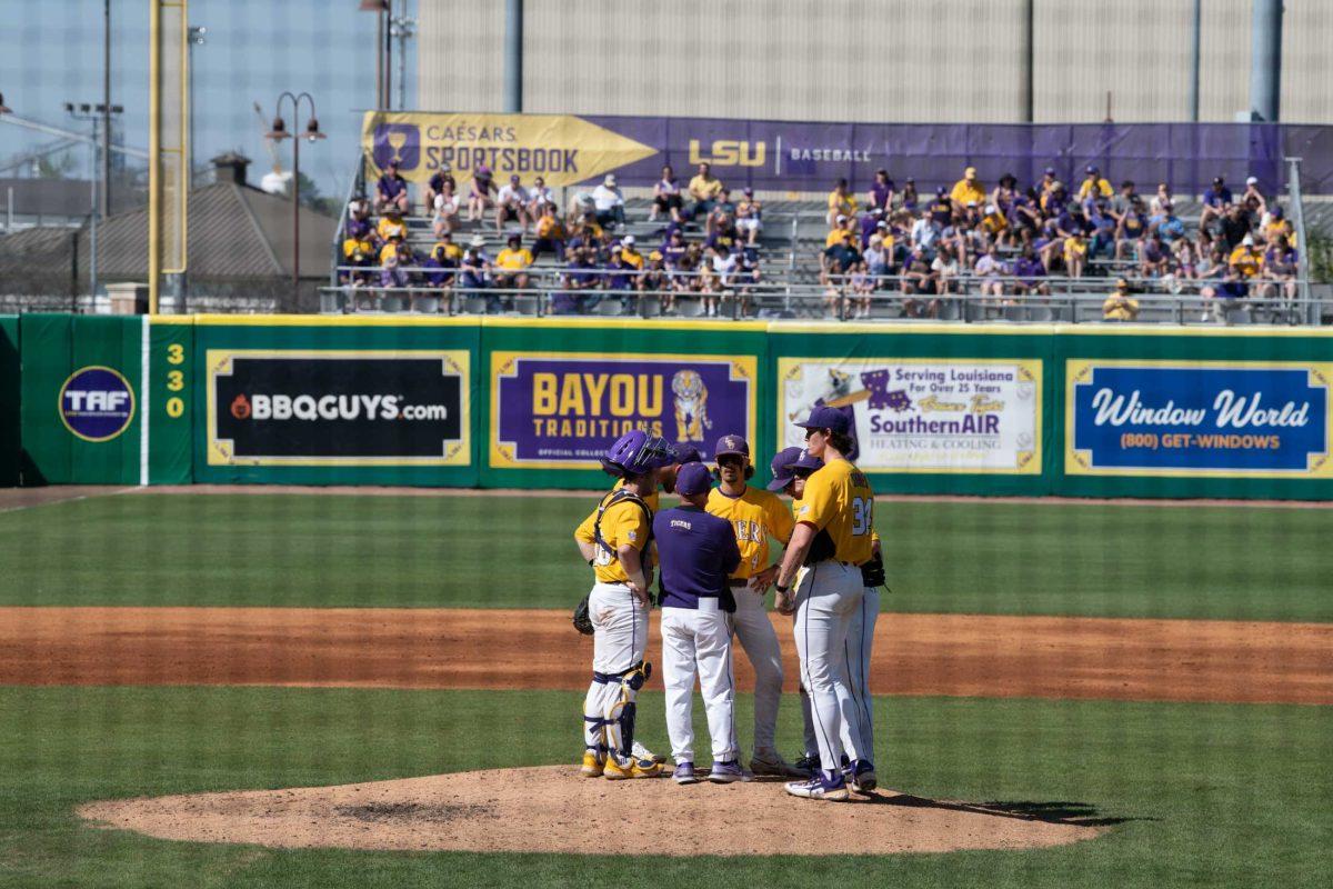 LSU baseball players convene during a mound visit Sunday, March 5, 2023, during LSU baseball's 13-0 victory over Central Connecticut State at Alex Box Stadium in Baton Rouge, La.