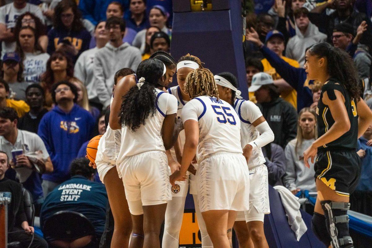 The LSU women's basketball team huddles up during their 66-42 win against Michigan in the second round of March Madness Sunday, March 19, 2023, at the Pete Maravich Assembly Center on N. Stadium Drive in Baton Rouge, La.