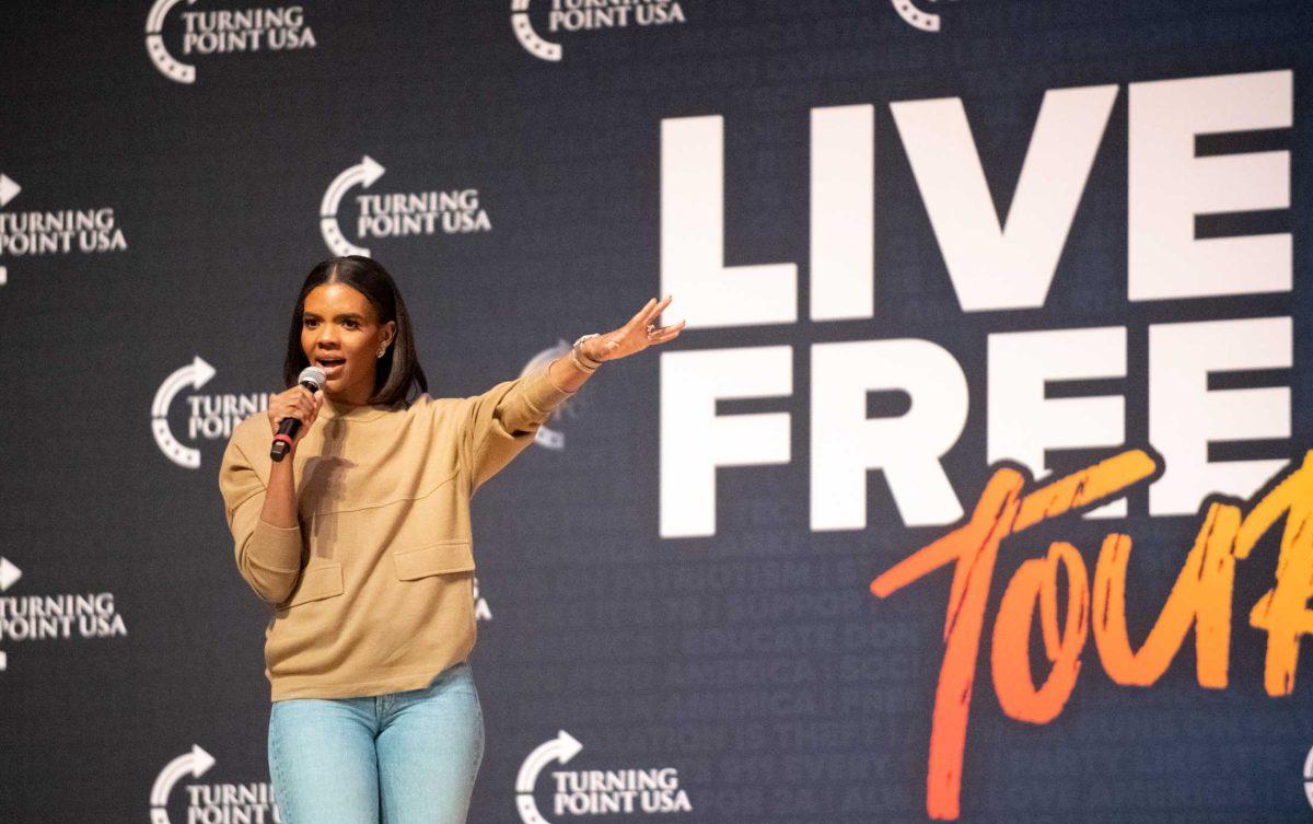 Candace Owens reaches out on Tuesday, March 21, 2023, in the Student Union in Baton Rouge, La.